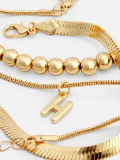 Schmuck|Primark Fußkette Mit Initiale & Unendlichkeitssymbol, 3er-Pack Gelb