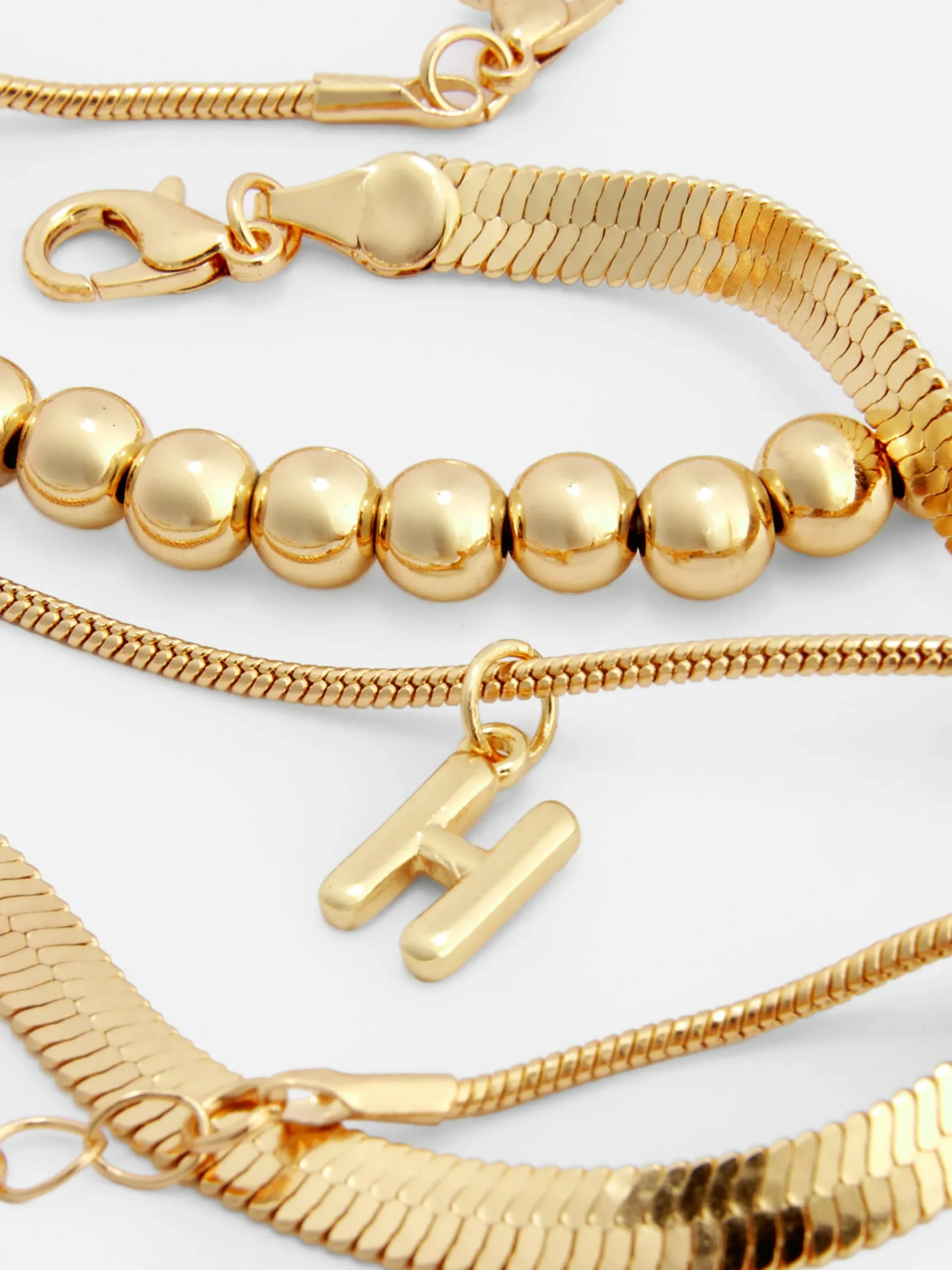Schmuck|Primark Fußkette Mit Initiale & Unendlichkeitssymbol, 3er-Pack Gelb