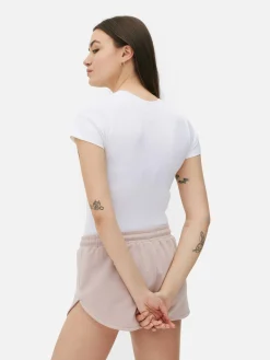 Tops Und T-Shirts|Primark Nahtloser, Gerippter T-Shirt-Body Weiß