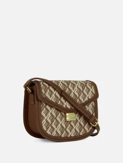 Taschen Und Portemonnaies|Primark Satteltasche Mit Monogramm Und Grafik Schokoladenbraun